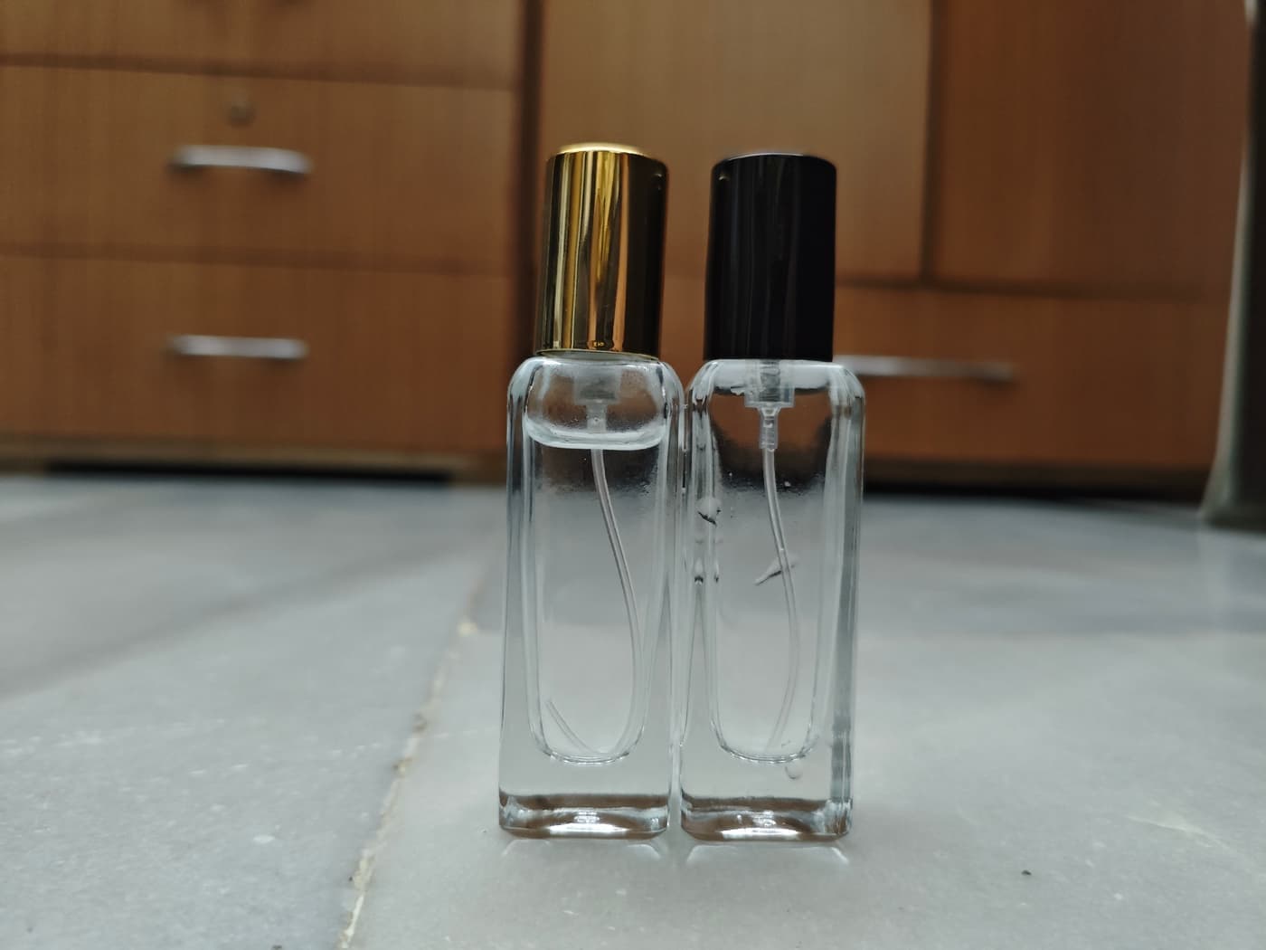 Empty 20ml spray bottle in gold and black